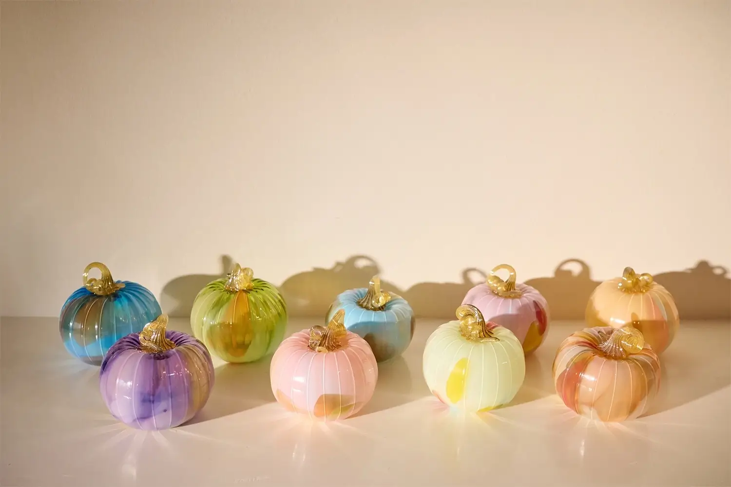 colorful glass pumpkins by little tomato glass