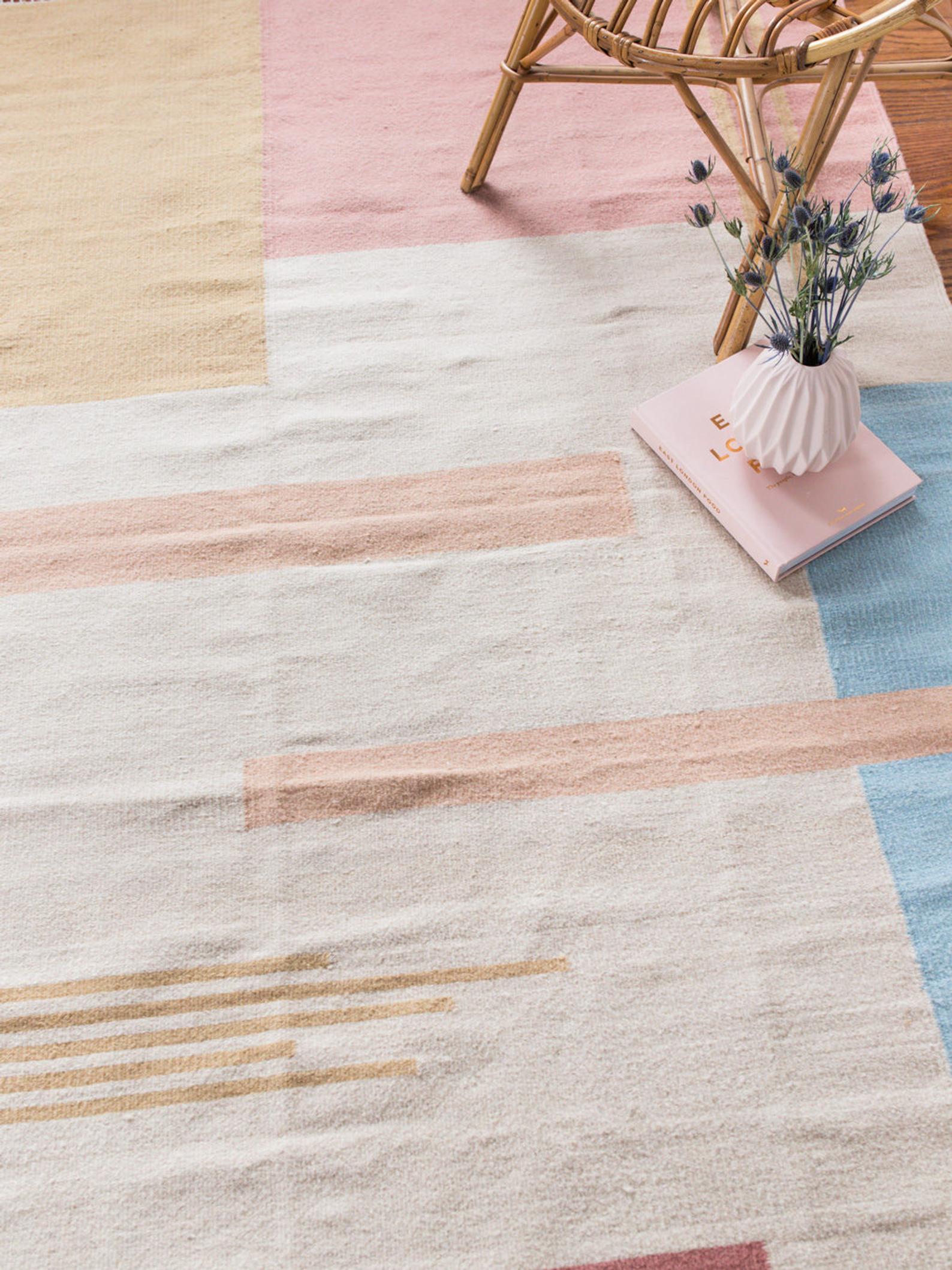 Pastel rug by loom and field