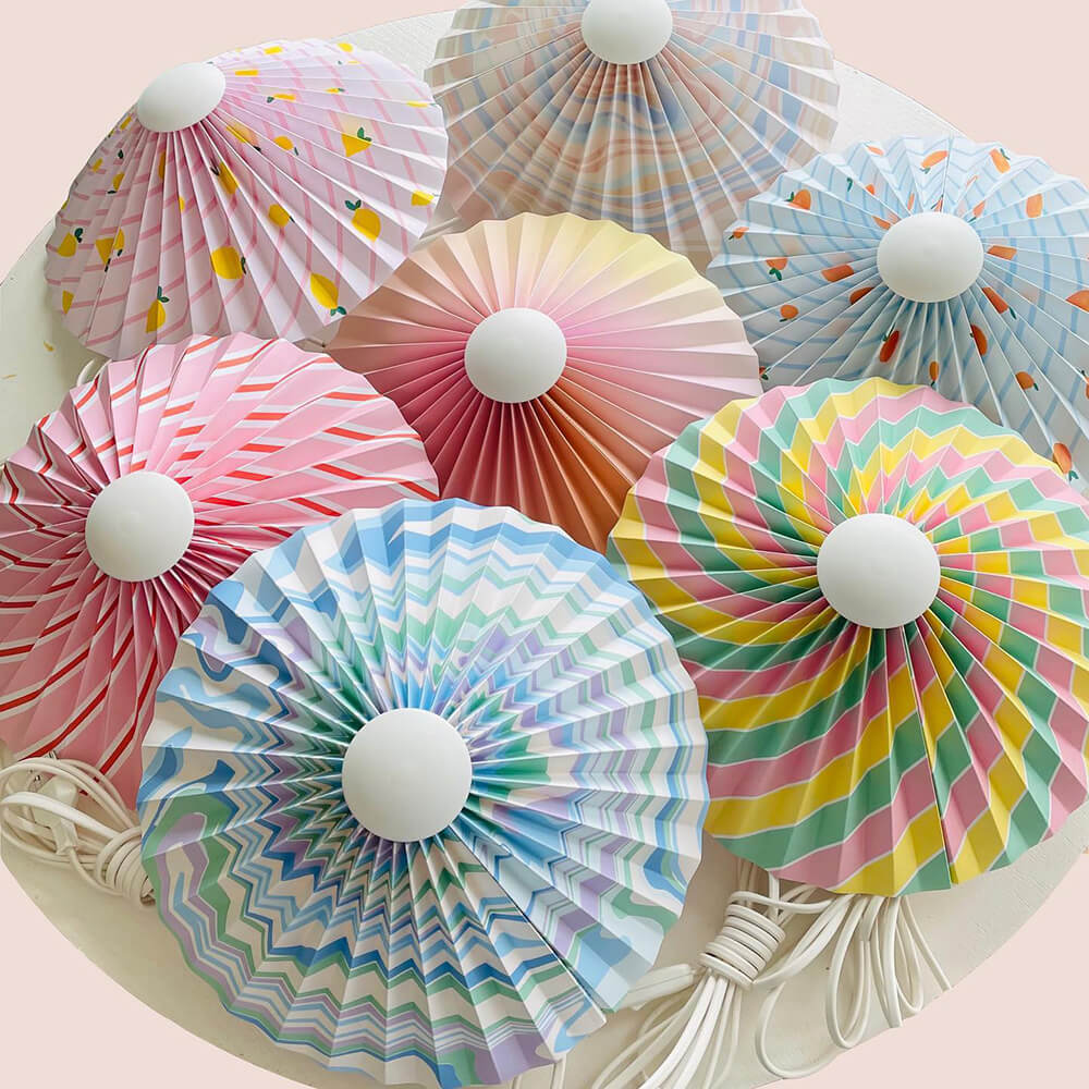 colorful pleated lampshades by interioer & genbrug