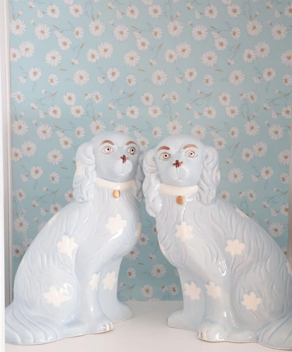 light blue ceramic staffordshire dogs