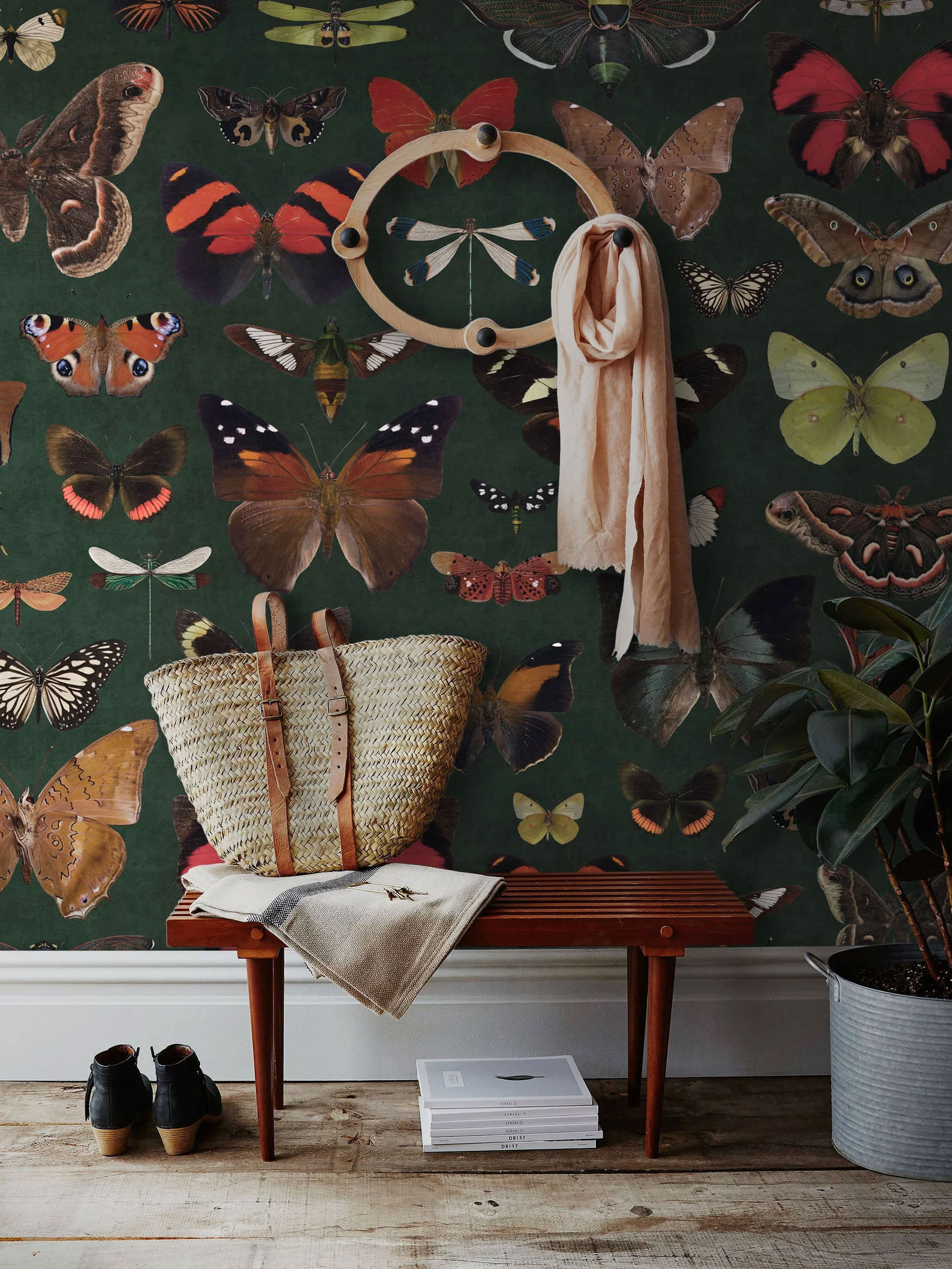 moody maximalist butterfly wallpaper in entryway