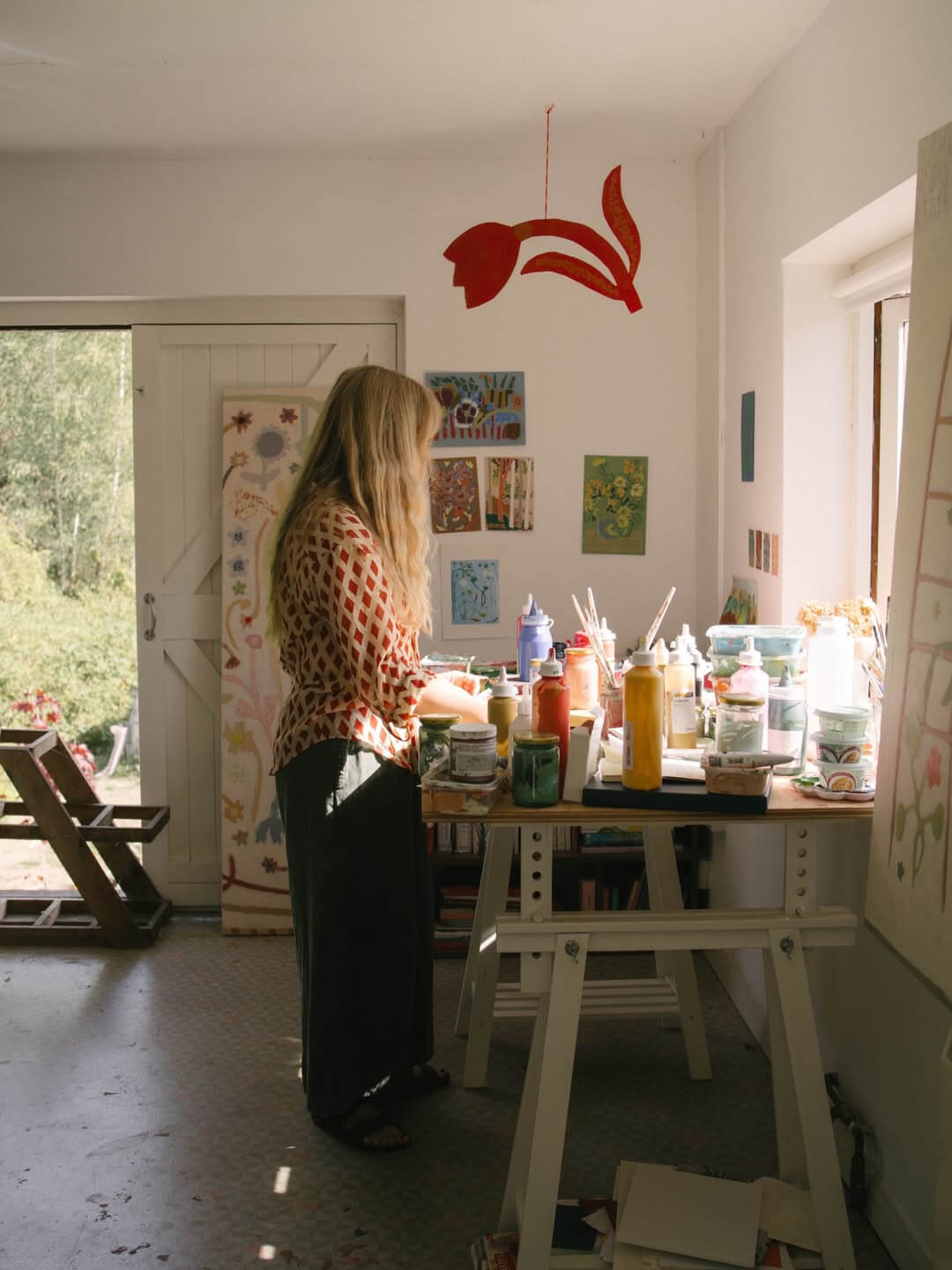 Rosie Harbottle of artist studio with in photos by Phoebe Piper Studio