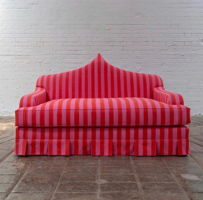 Bespoke sofa by Campbell-Rey Interiors using pink and red Lisa Corti stripes.
