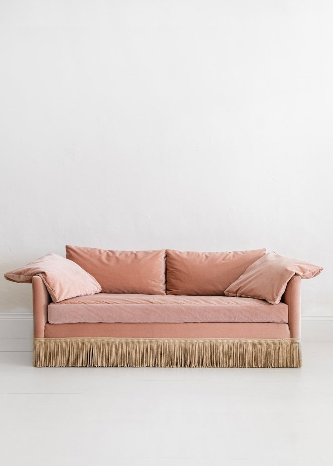 Pink fringe couch