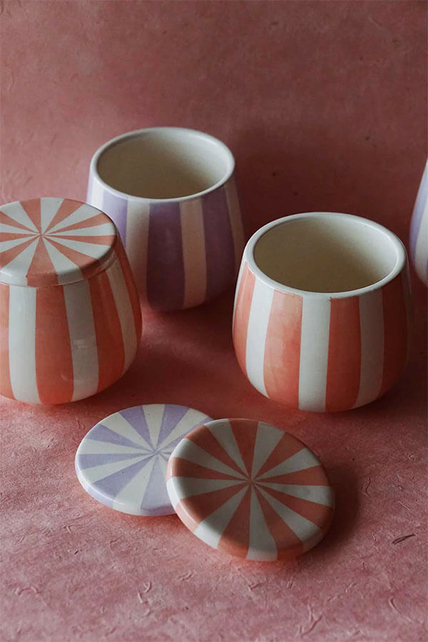 circus striped ceramic jars in lilac and pink