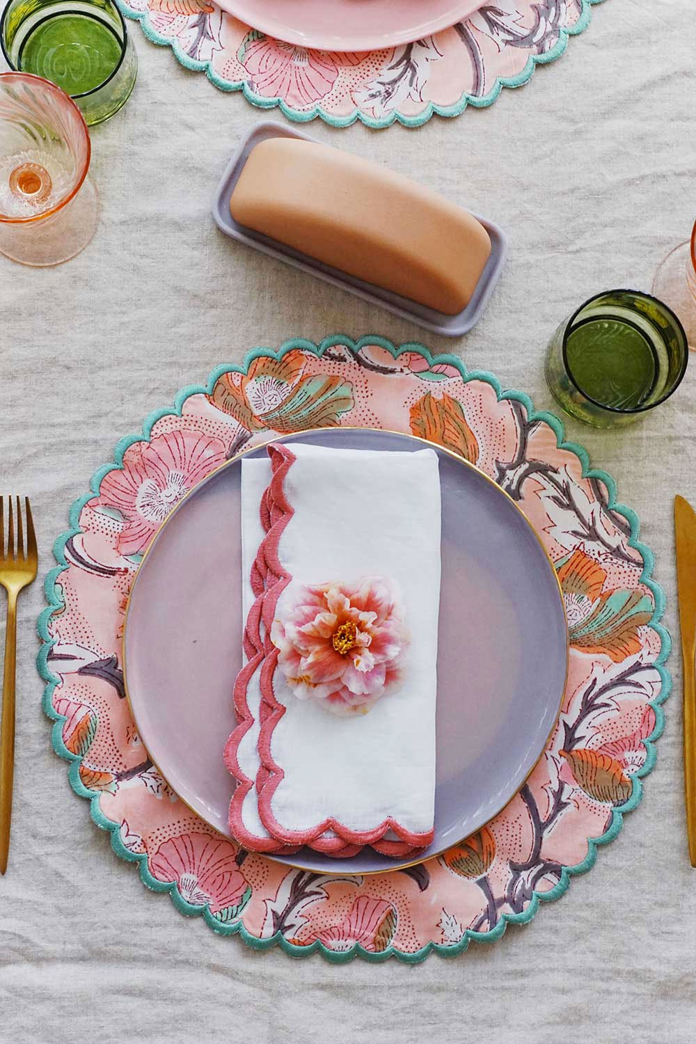 pink floral scalloped placemats for spring tablescape