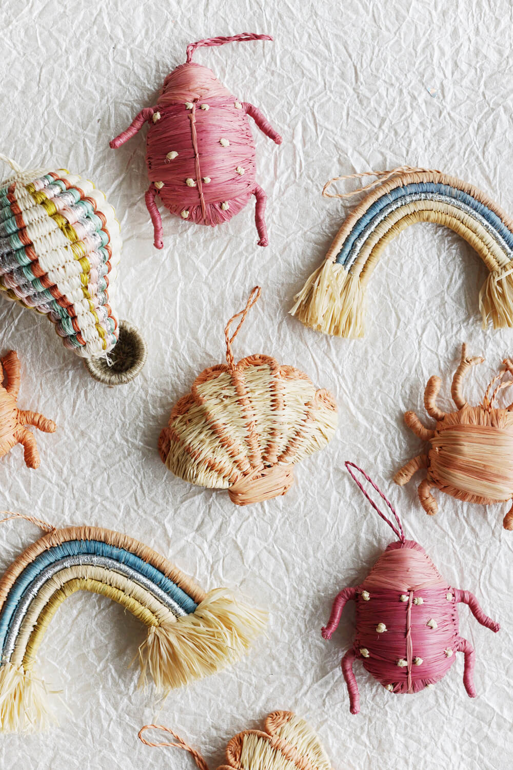 cute woven christmas ornaments - coastal crab, sea shell, pastel rainbow