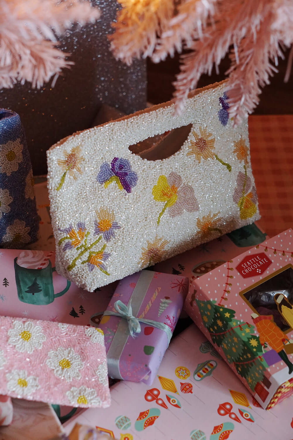 floral beaded clutch on top of pretty wrapping paper - handmade gift ideas from wallflower