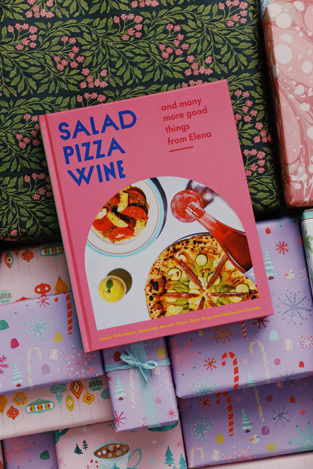 salad pizza wine book and pretty wrapping paper for the holidays