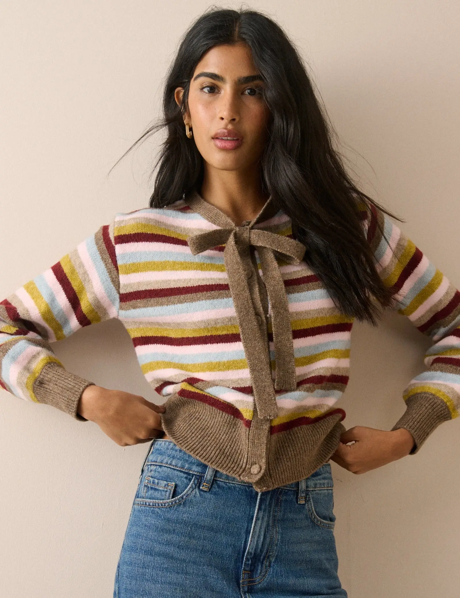 Striped bow tie statement sweater by Nobody's Child for Fall 2026