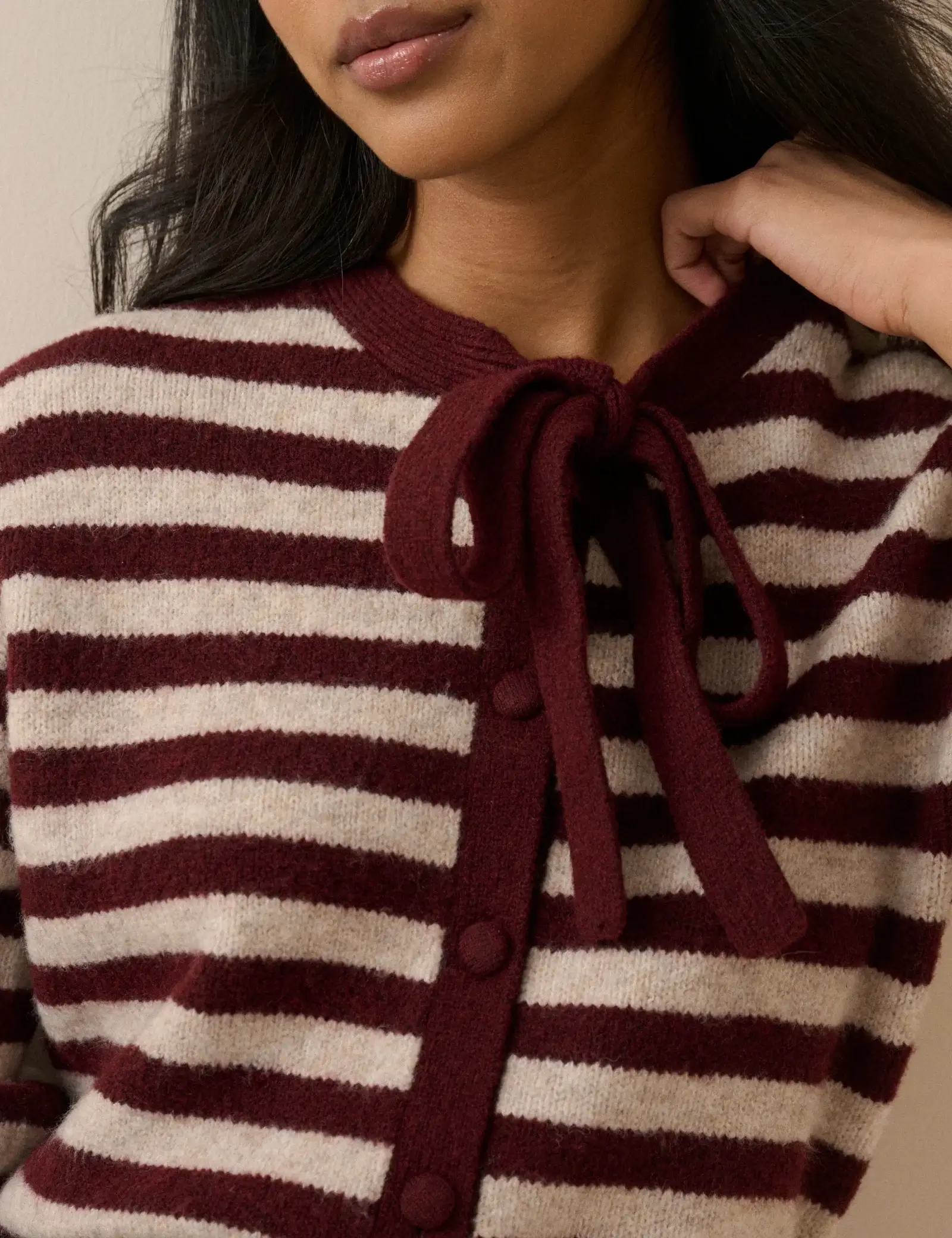 Pink and burgundy sweater with bow tie from Nobody's Child
