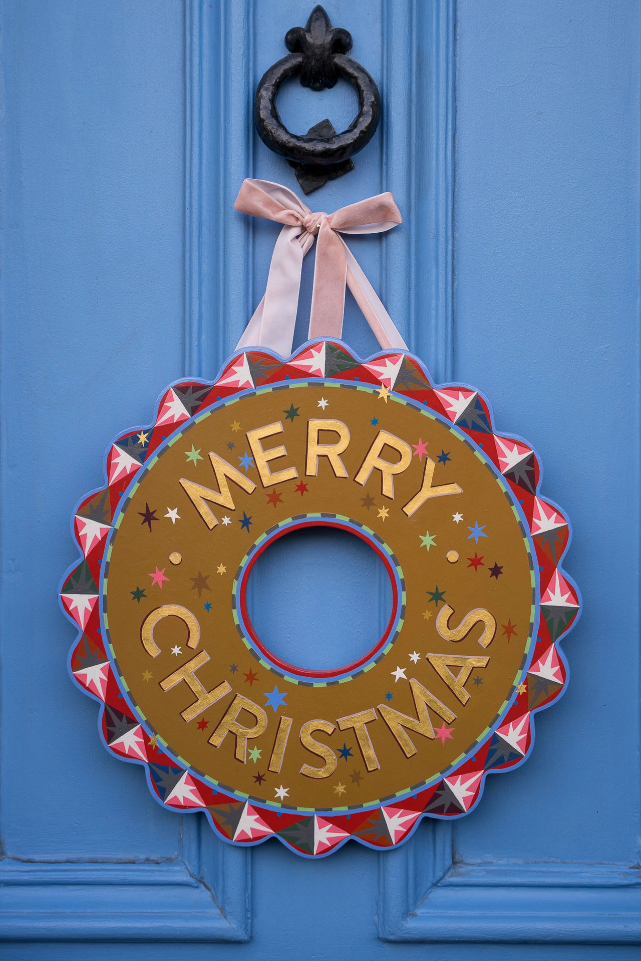 Merry Christmas hand painted wreath by Gabriella Moxey